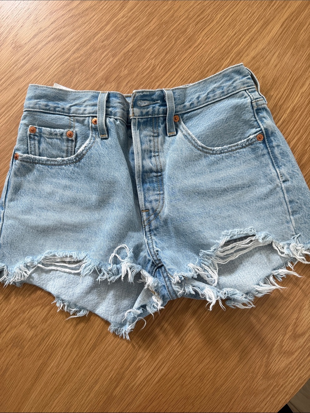 Vintage Levi’s Light Blue Distressed Denim Shorts